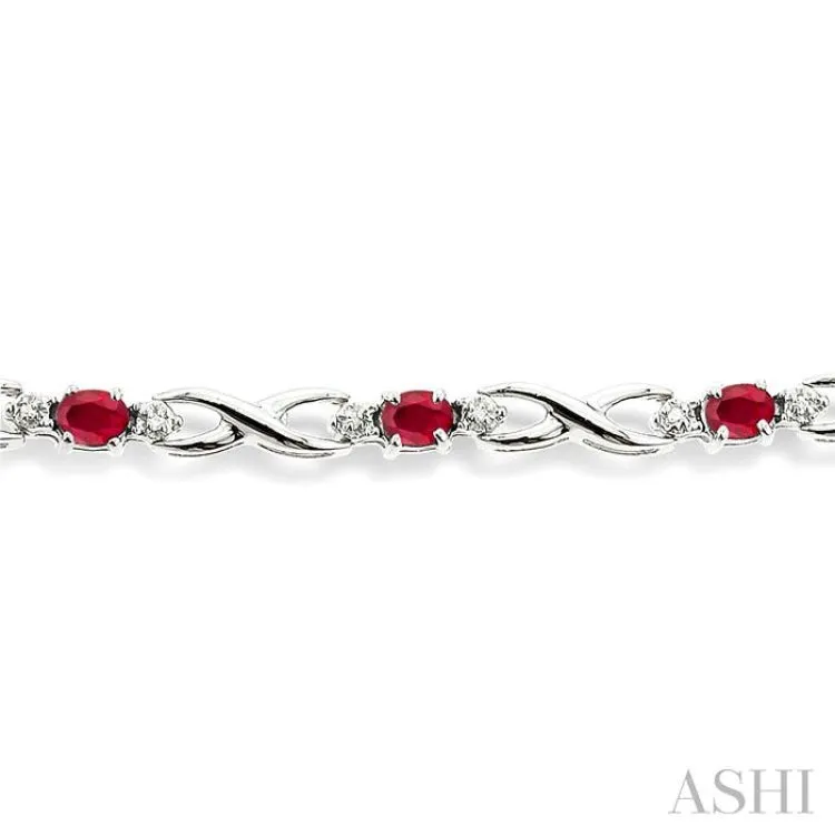 4x3mm Oval Cut Ruby and 1/10 Ctw Single Cut Diamond Bracelet in 10K White Gold